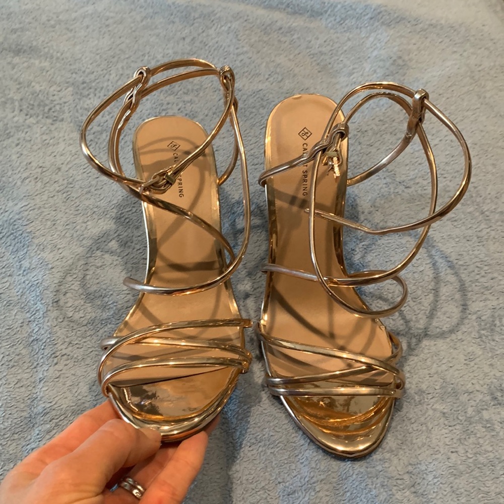 Gold call it spring heels size 7. 4 1/2 inches.